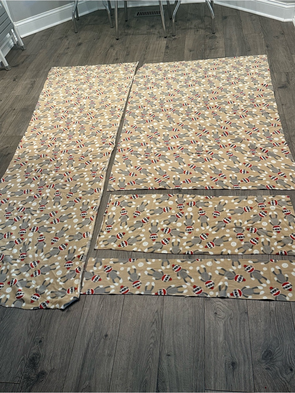 Novelty Sock Monkey Print fleeceFabric - Tan Red Brown